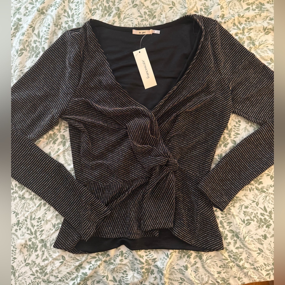 Francesca‘s black and metallic striped shirt
